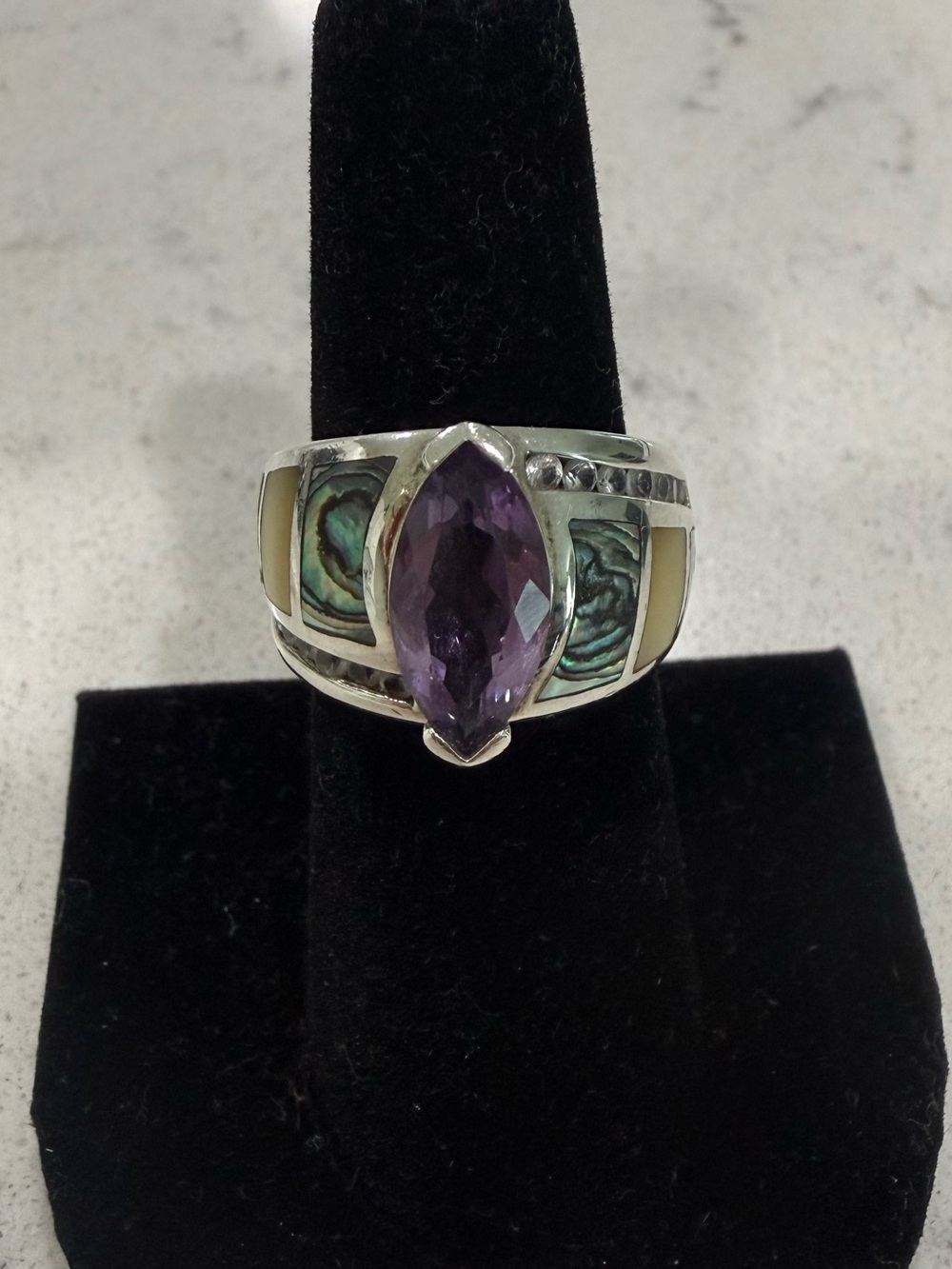 Sterling Silver Ring with Marquise Amethyst and white topaz gemstones on sides